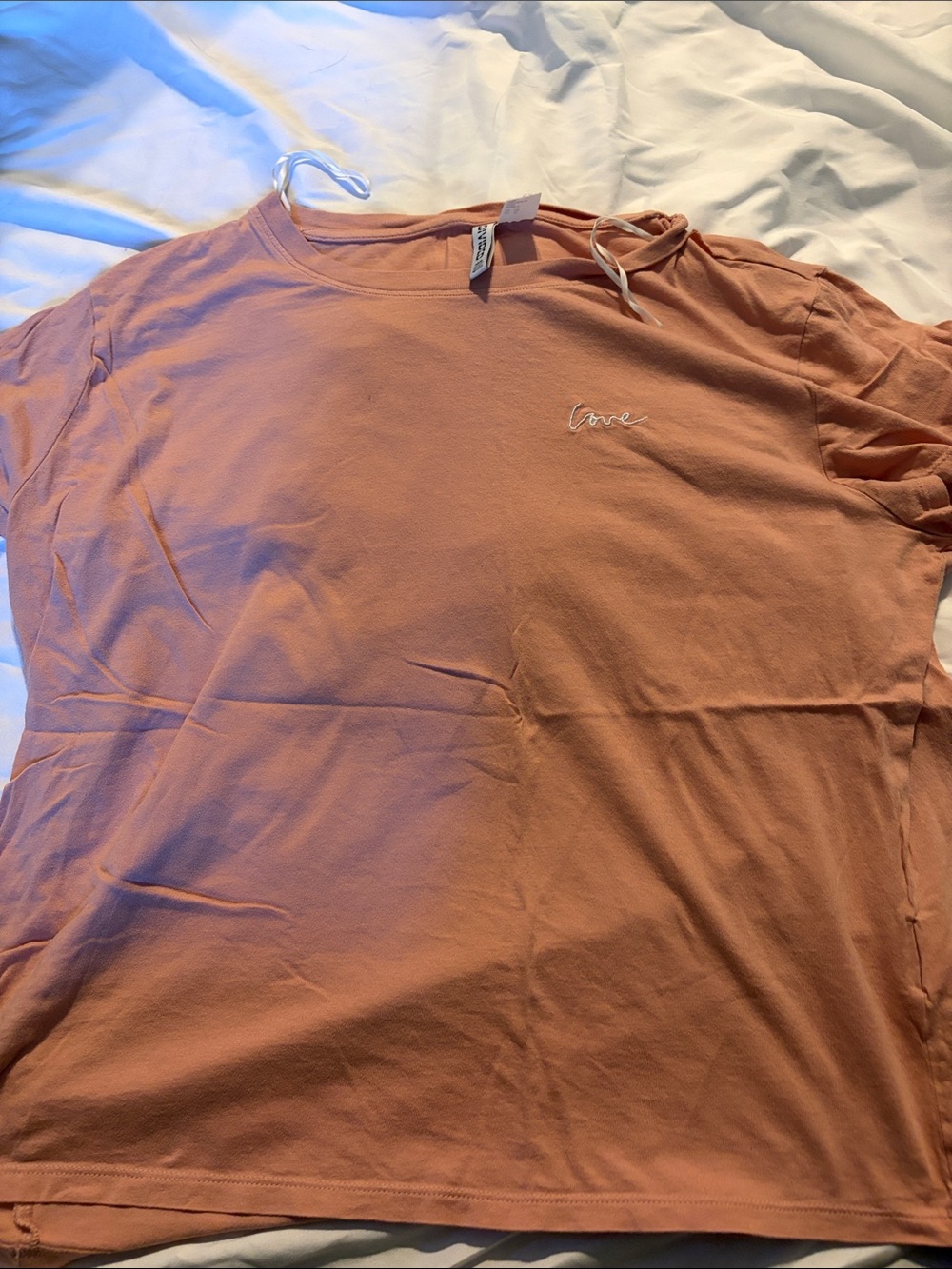 Divided Peach Short Sleeve Tee with Subtle Script